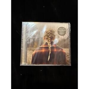 An Unopend Taylor Swift Evermore CD